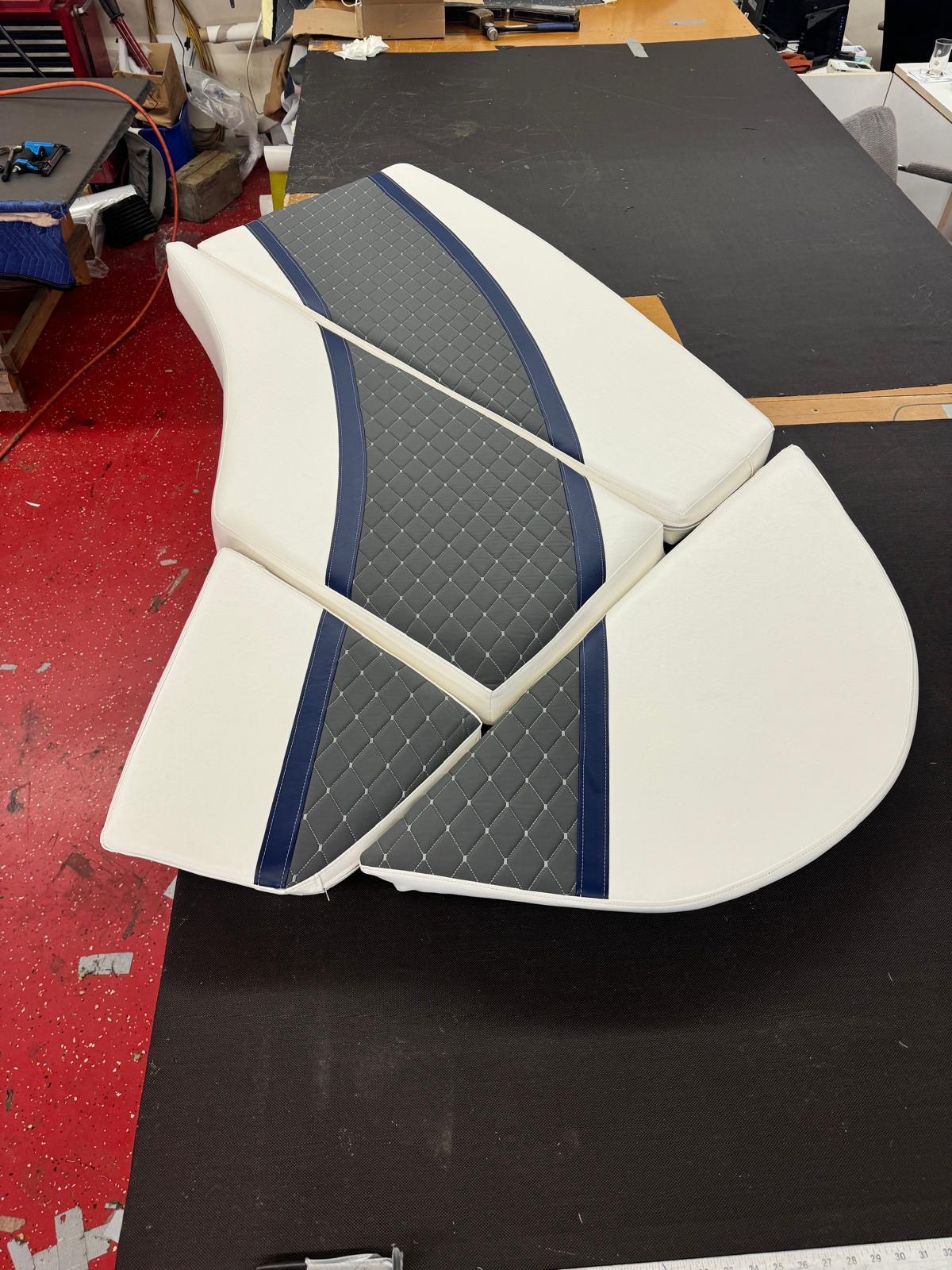 Cushion fabrication in progress on workbench