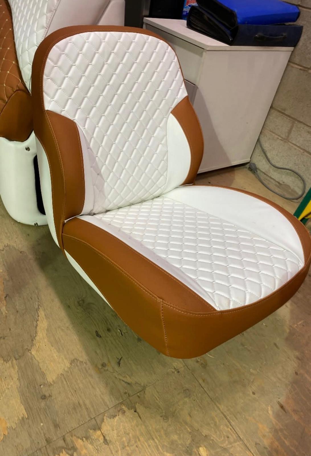 Custom quilted helm seat re-upholstery